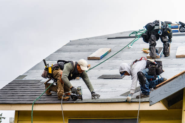 Professional Gutter Installation technician working in Cable, OH